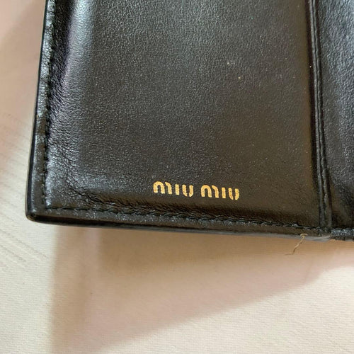 Miu Trifold Wallets
