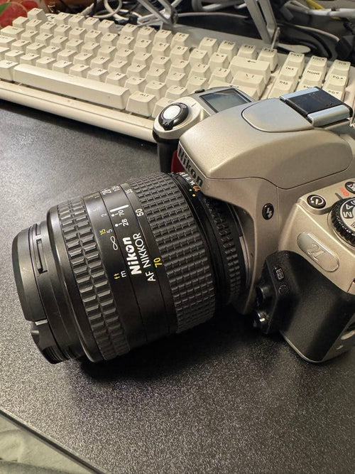Nikon Slr Camera (Film) Af Nikkor