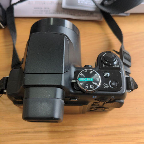 Pentax Compact Digital Camera X70 12