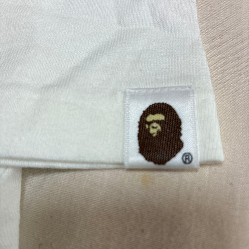 Een badende aap T-shirts symbool T M