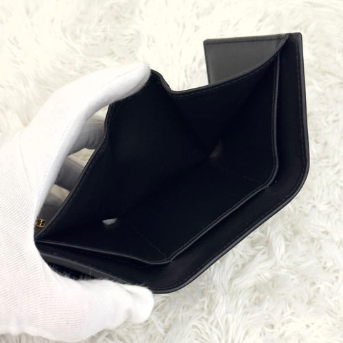 Prada Trifold Wallets