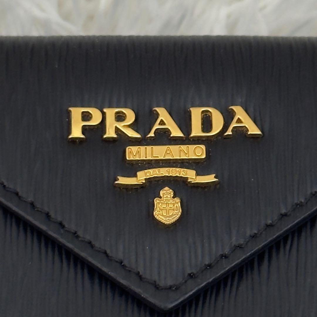 Prada Trifold Wallets