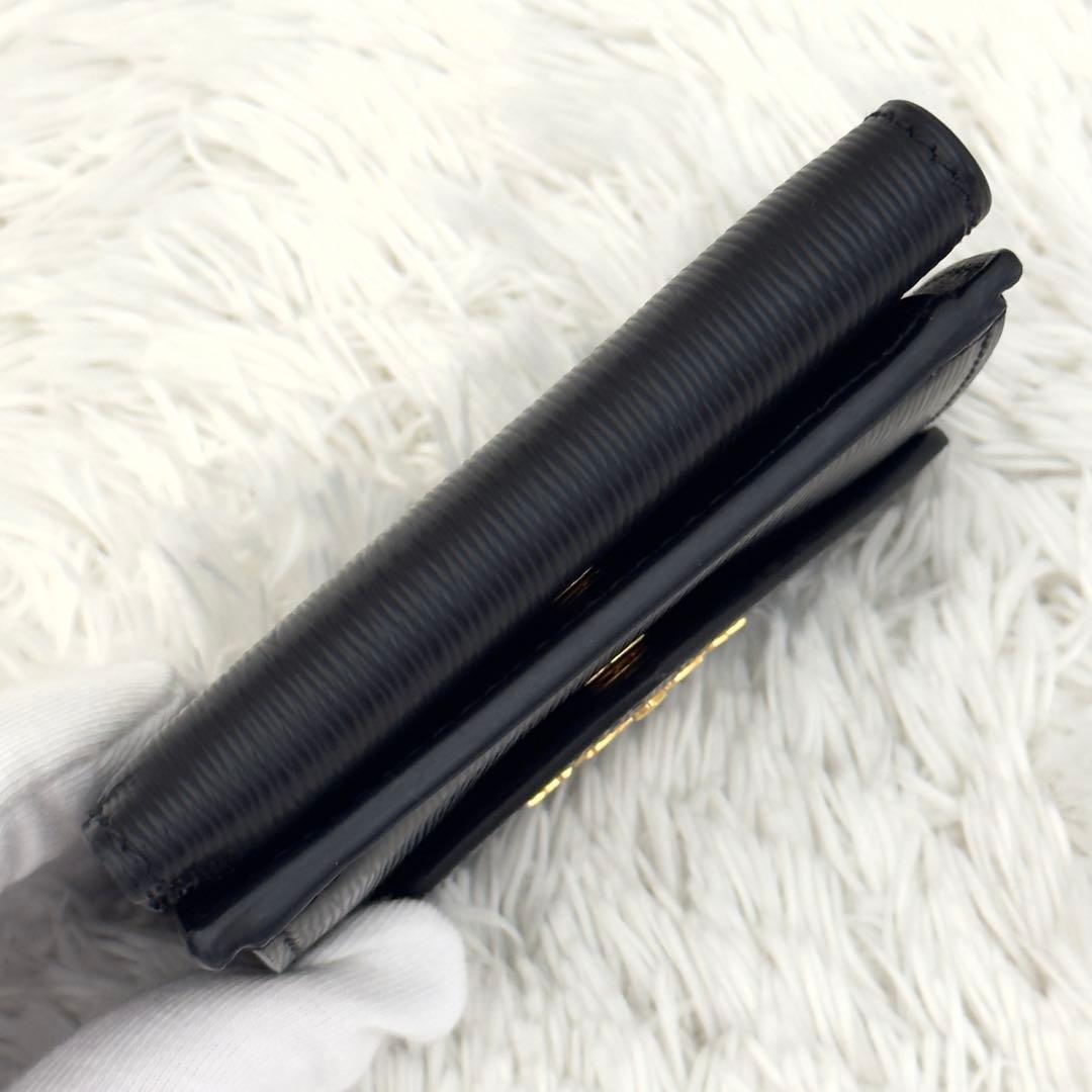 Prada Trifold Wallets