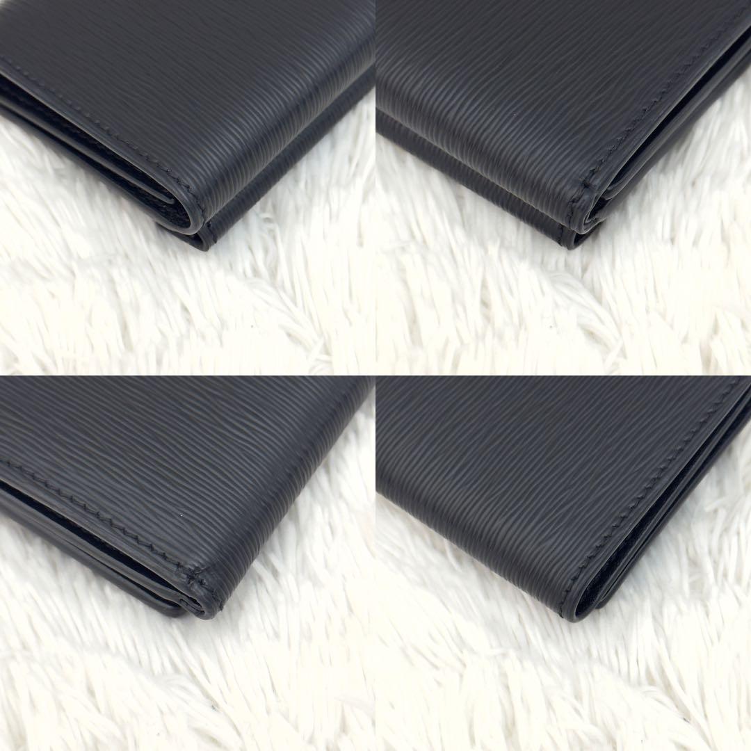 Prada Trifold Wallets