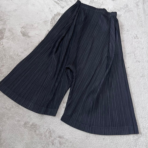 Pleats Please Wide-Leg Pants Loose-Fitting