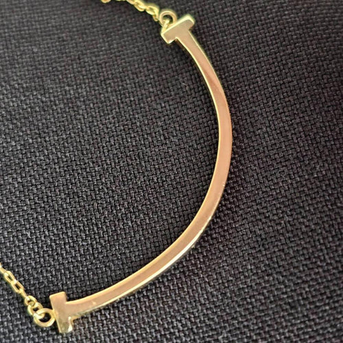 Tiffany Necklaces Co. T Smile Necklace Yg