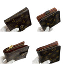 Louis Vuitton Portefeuille à deux volets M61667