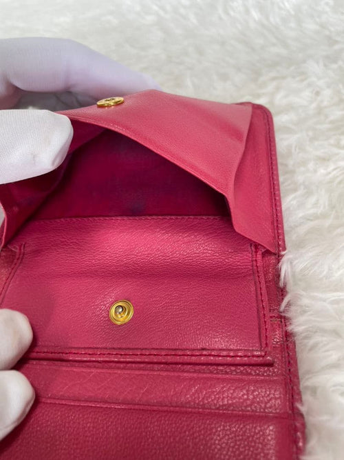 Prada Trifold Wallets