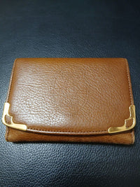 Cartier Trifold Wallets