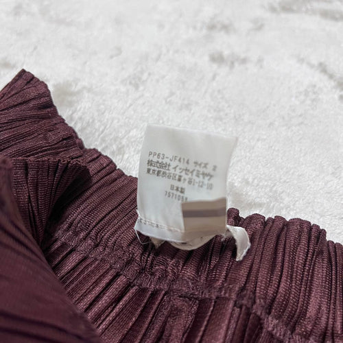 Pleats Please Wide-Leg Pants Loose-Fitting