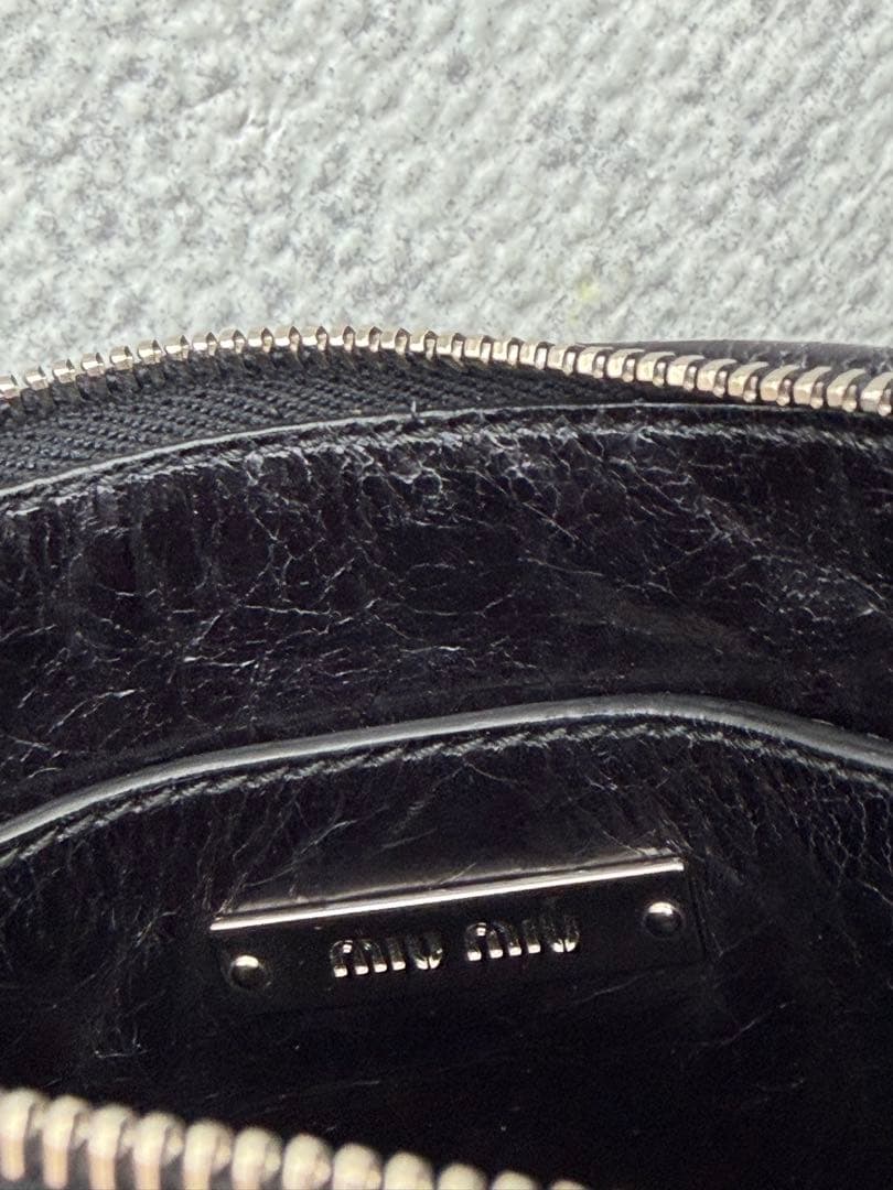 Miu Clutch Bags