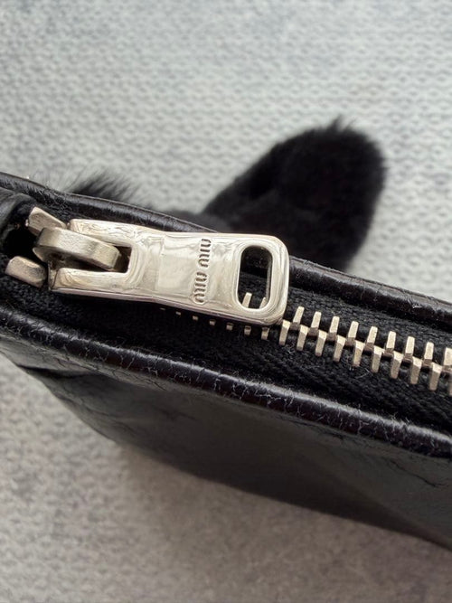 Miu Clutch Bags