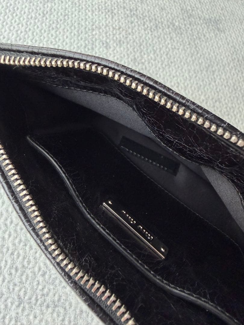 Miu Clutch Bags