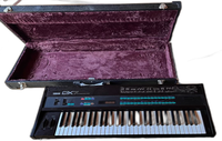 Yamaha Analog Synthesizer Dx7 .Grey Matter