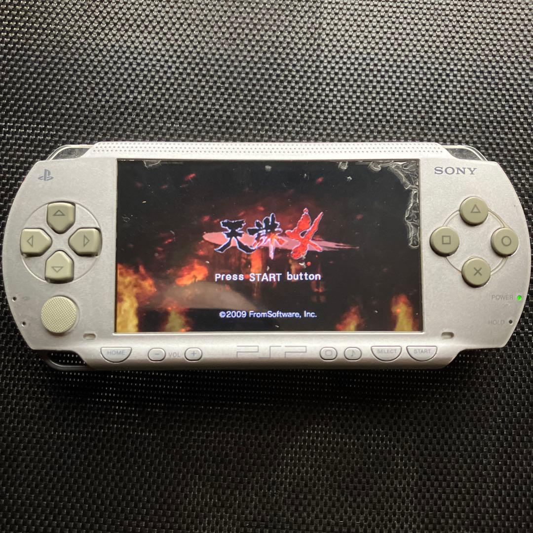 sony psp-1000 handheld console front view
