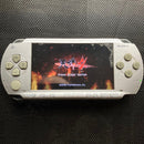 sony psp-1000 handheld console front view