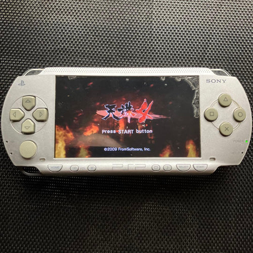 sony psp-1000 handheld console front view