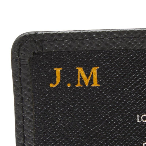 louis vuitton m32562 coin purse markings and labels