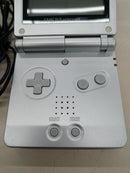 nintendo ags-001 handheld console rear view