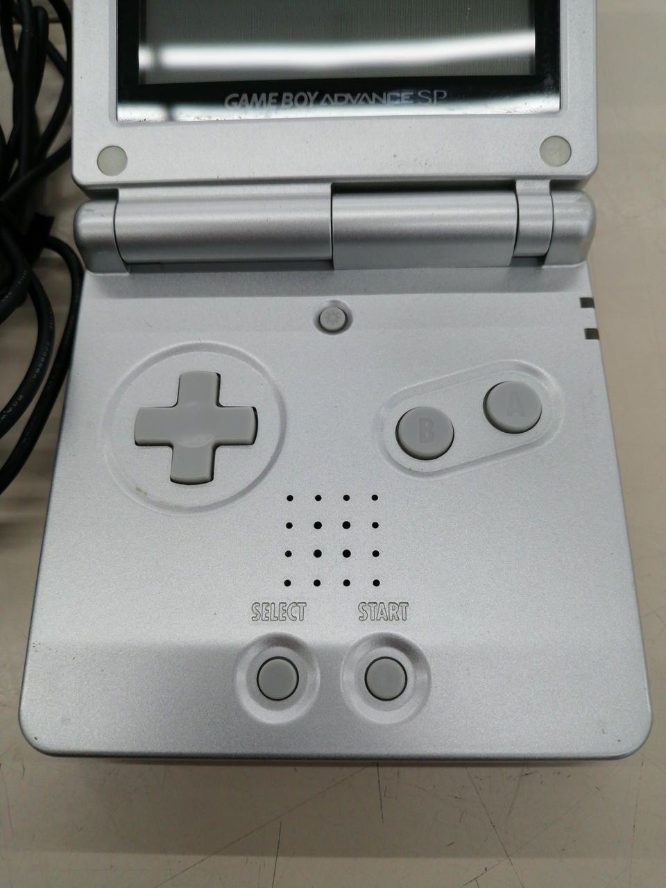 nintendo ags-001 handheld console rear view