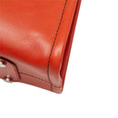 hunting world orange handbag side view