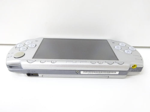 sony psp-2000 handheld console side view