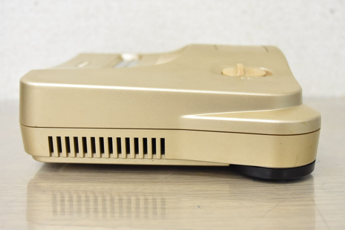 nintendo nus-001 video game console side view