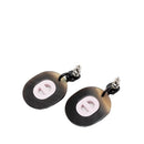 hermes pink earrings front view
