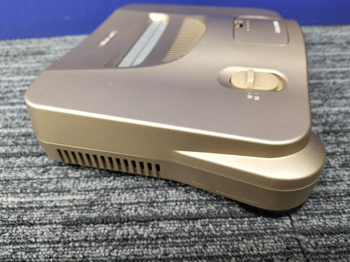 nintendo nus-001 video game console side view