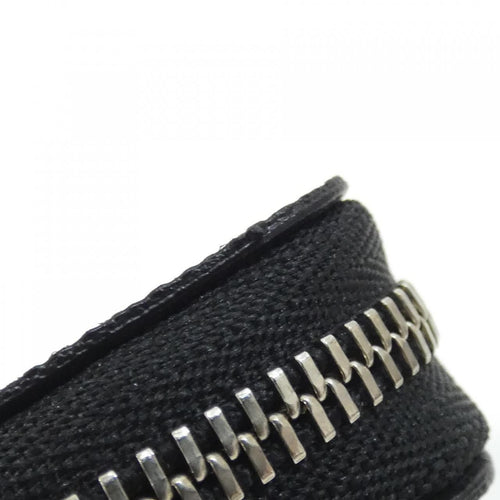 louis vuitton n63076 coin purse side view