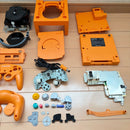 nintendo gamecube dol-001 orange handheld console side view
