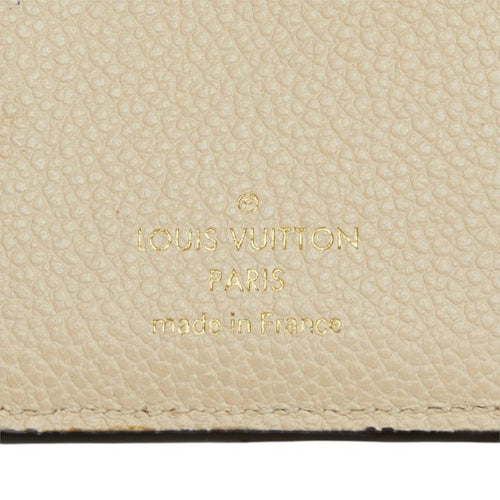 louis vuitton m81071 cream wallet condition details