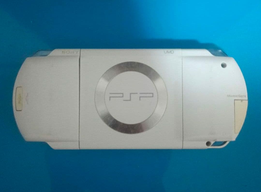 sony psp-1000 handheld console front view