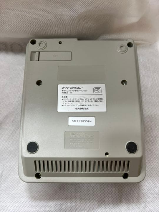 nintendo shvc-001 video game console rear view