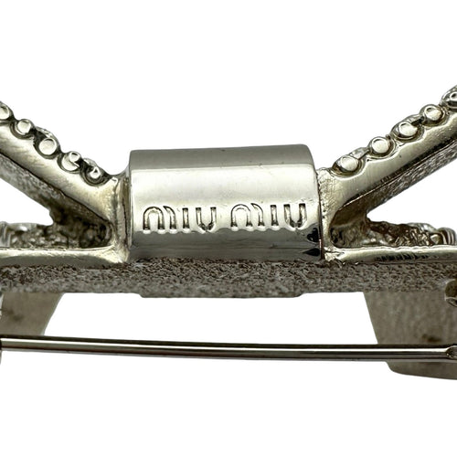 miu miu brooch interior details