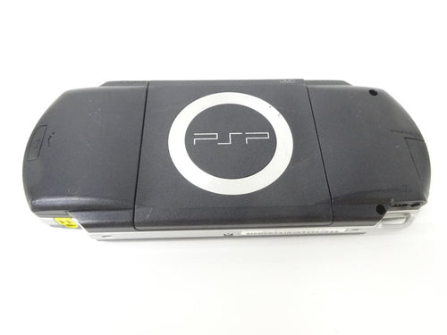 sony psp-1000 handheld console front view