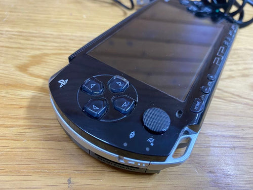sony psp-1000 handheld console rear view