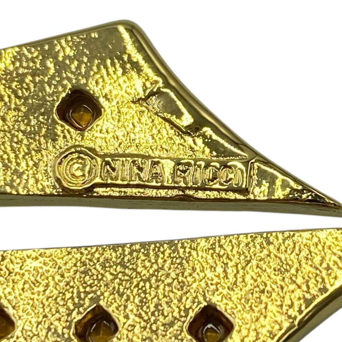 nina ricci brooch side view