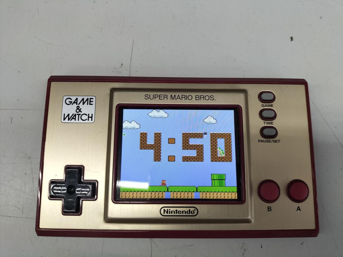 nintendo hxa-001 handheld electronic game rear view