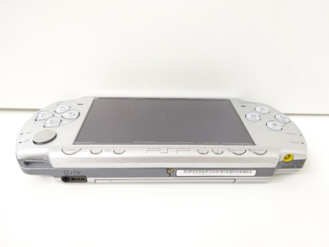 sony psp-2000 handheld console side view