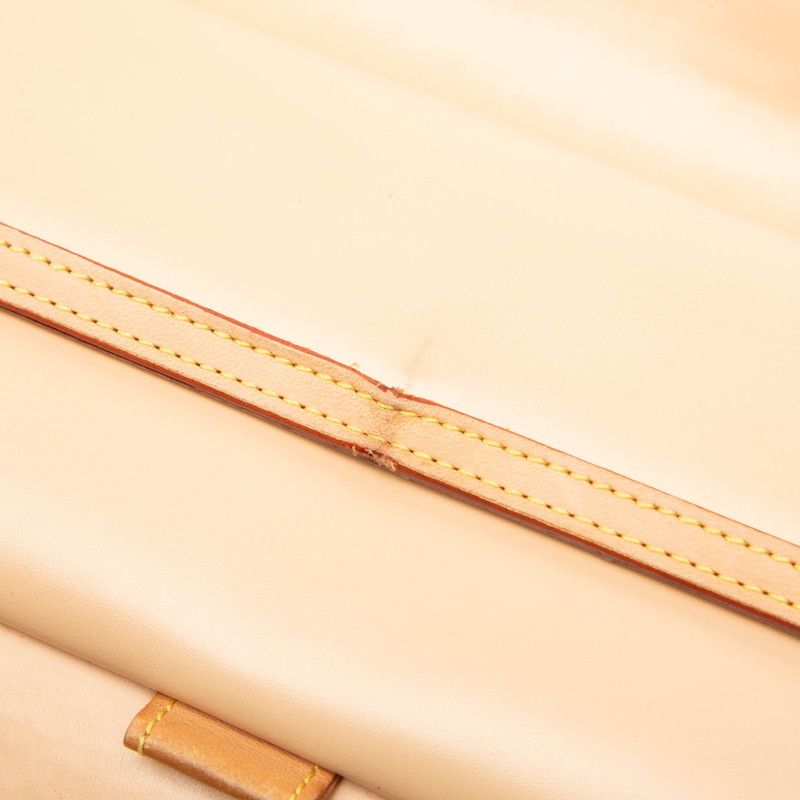 louis vuitton m92658 wallet side view