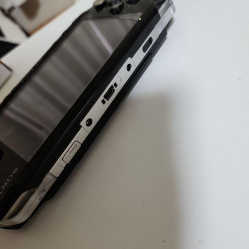 sony psp-1000 handheld console accessories included