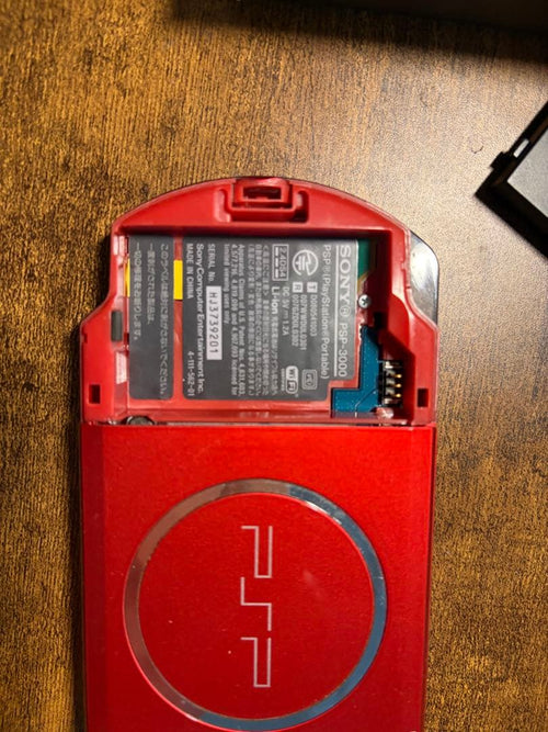 sony psp-3000 handheld console side view
