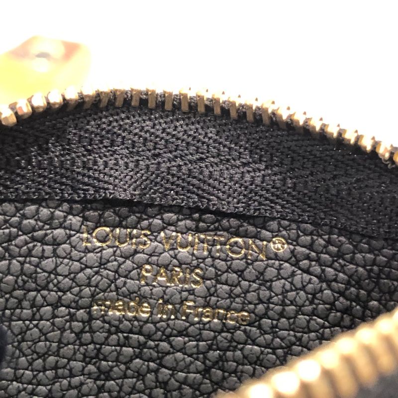 louis vuitton m80879 coin purse condition details