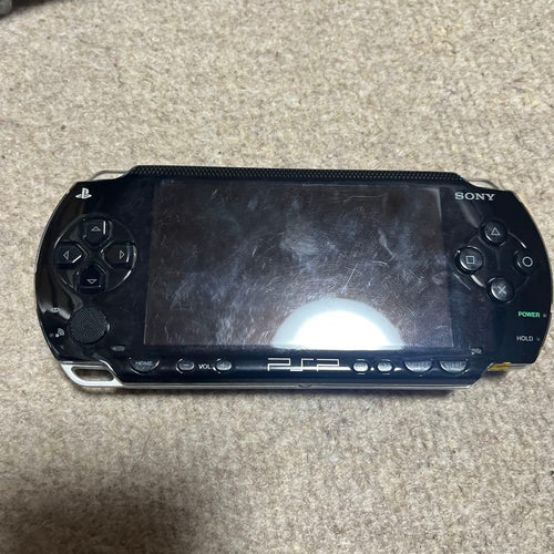 sony psp-1000 handheld console front view