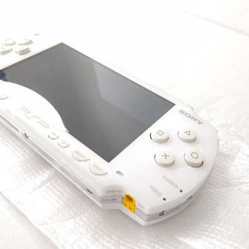 sony psp-1000 handheld console side view