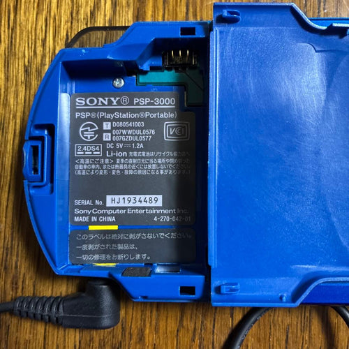 sony psp-3000 handheld console side view