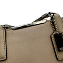 coach beige handbag side view