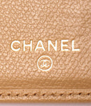 chanel beige wallet side view