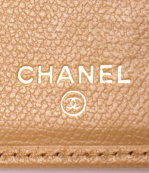 chanel beige wallet side view